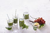 Stinging nettle and spinach smoothies with grapes and ginger