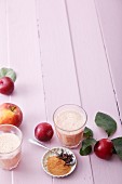 Apple and plum smoothies with almond milk and spices