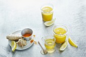 Orange and apple smoothies with honey, ginger and turmeric