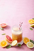A citrus fruit smoothie with mint and turmeric
