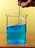 Dissolving copper sulphate crystals