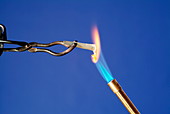 Heating zinc in a flame