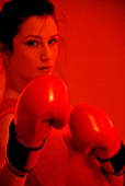 Woman boxing in a gym