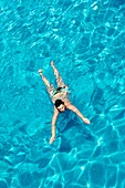 Woman swimming in a pool