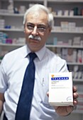 Pharmacist with Relenza packet