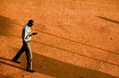 Man using a mobile phone,Uganda