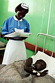 Hospital nurse and patient,Uganda