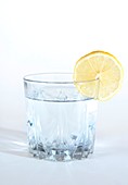 Tonic water with lemon in glass