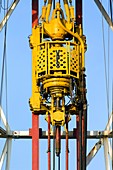 An oil-rig drilling derrick