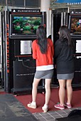 Korean girls at Playstation console