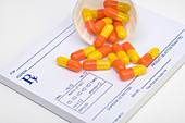 Capsules on a prescription or Rx pad