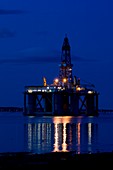 Oil drilling rig at night,North Sea