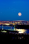 Moon over Vancouver,time-exposure image