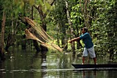 Throwing a fishing net,Amazonia