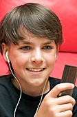 Teenager listening to music