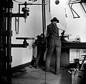 Wilbur Wright in his workshop,1902