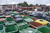 Used and damaged wheelie bins in compound
