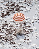Soyuz TMA-16 spacecraft landing on Earth