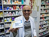 Pharmacist holds Metformin tablets