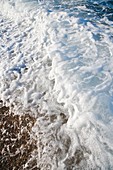 Waves breaking on a beach