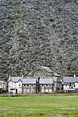 Slate mine waste mountain and houses