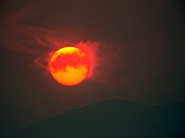 Sun setting behind smoke from bushfires