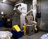 Plastics recycling machine in a factory