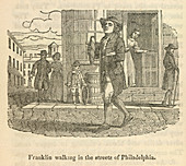 Franklin walking in Philadelphia