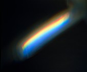 Rainbow against a black background