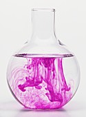 Flask with purple liquid
