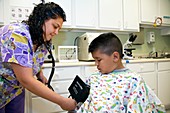 Measuring a child's blood pressure