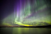 Aurora borealis over water
