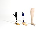 Three prosthetic legs