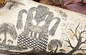 Ink scrimshaw on dolphin skull