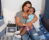 Boy with bent bone dysplasia with mother