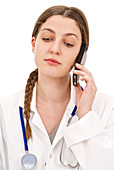 Doctor with stethoscope and mobile phone