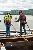 Bridge lift construction workers