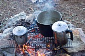 Pots on a camp fire