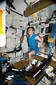 Astronaut exercising on the ISS