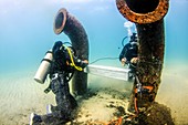 Commercial divers underwater
