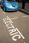 Electric car at a recharging station