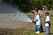 Volunteers at an urban farm,USA