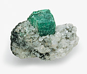 Emerald crystal in white calcite matrix