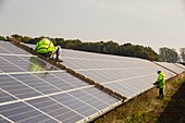 Technicians work on Wymeswold Solar Farm