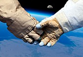 Cosmonaut and astronaut shaking hands