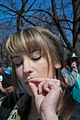 Young woman smoking marijuana