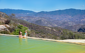 Sunbathers at a geothermal pool