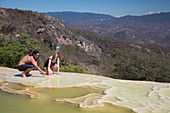 Sunbathers at a geothermal pool