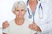 Elderly woman with doctor