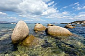 Round granite boulders on coast